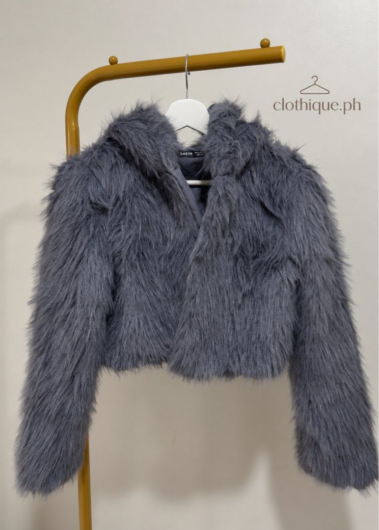 FurCoat with Hood 🎀 (Category: Coats, Jackets and Outerwear) located in Makati City. Submitted by clothique.ph (Listing ID 1462702310, Image 1). Description: ♡ Fur Coat Jacket with Hood ♡ 𝒩𝑒𝓌 • 𝒩𝑒𝓋𝑒𝓇 𝒲𝑜𝓇𝓃 • 𝒩𝑜 𝐹𝓁𝒶𝓌𝓈 🤍 𐙚 SHEIN Brand 𐙚 Cozy & stylish fur coat 𐙚 Comes with hood 𐙚 Brand new condition ✨ ♡ Perfect for chilly days & effortless winter looks ☁️🧸 PM if interested! 💌.