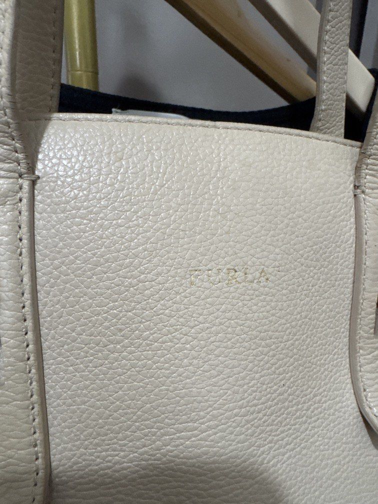 Furla Beige Shoulder Bag (Category: Shoulder Bags) located in Mexico. Submitted by studioleraph (Listing ID 1462722417, Image 2). Description: 🏷️ Brand: Furla 👜 The actual item being sold is the original bag shown in the product photos. Small differences in color, texture, or details may occur. 💌 Condition: • Preloved; Have flaws • Please manage expectations as these are vintage/pre-owned pieces. • Colors may vary slightly due to lighting and 