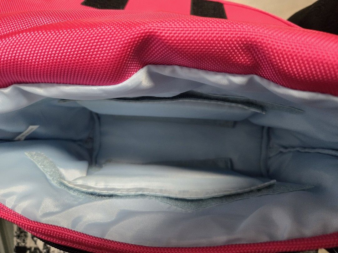 Gadget Camera Sling Bag (Category: Cross-body Bags) located in Manila. Submitted by luxtimeless (Listing ID 1462796218, Image 2). Description: - Bright pink TRUC sling bag - Main compartment with internal pockets - Adjustable strap - Perfect for everyday use or travel - Clean inside and out.