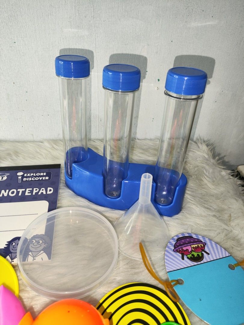 GALT Science Lab STEM Kit with Fun Experiments (Category: Educational & Learning Toys) located in Cavite. Submitted by tinetaclesss (Listing ID 1462783032, Image 2). Description: - GALT Science Lab Kit for aspiring young scientists. - Includes essential lab equipment: test tubes, stand, funnel, petri dish, and goggles. - Comes with exciting experiment materials: slime and colorful powders. - Features a notepad and stickers for recording observati