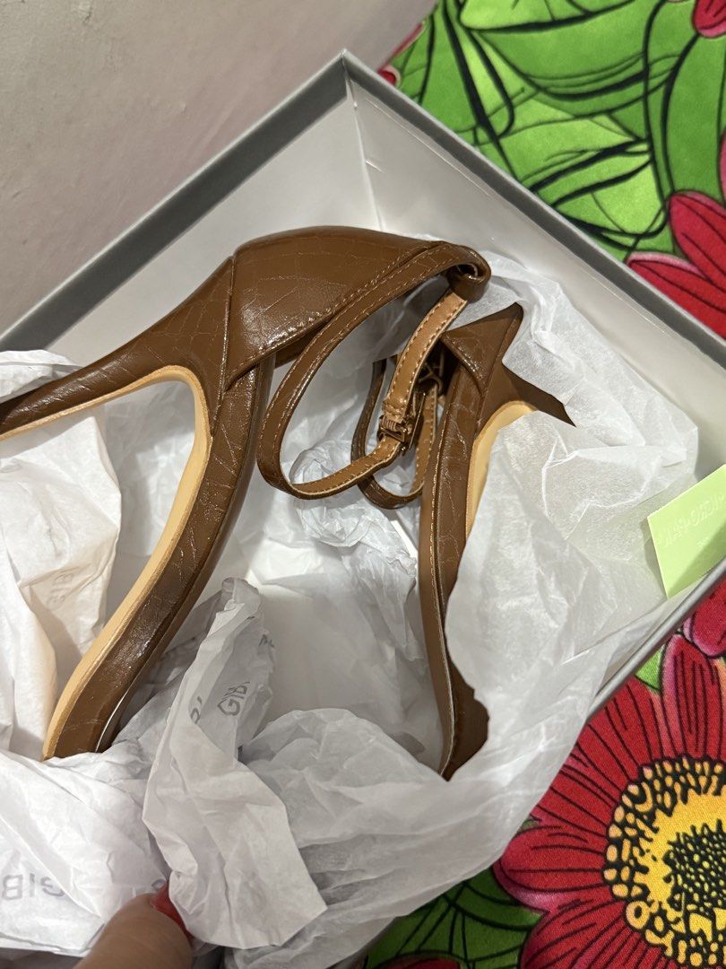 GIBI BROWN HIGH HEELS (Category: Heels) located in Pasig City. Submitted by cathy.massage.official (Listing ID 1462863871, Image 3). Description: NO ISSUE GOOD AS NEW HINDI PO NASOOT KASI MALAKI SAKIN COMES WITH BOX SIZE 39.