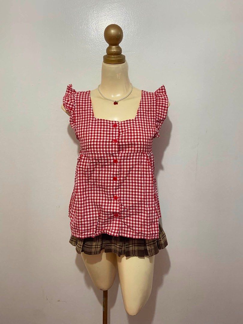 Gingham Ruffle-Sleeve Peplum Blouse Top (Category: Blouses) located in Mandaluyong City. Submitted by cxia_style (Listing ID 1462760282, Image 1). Description: details: ୨ৎ non stretch ୨ৎ w/ buttons ୨ৎ ruffle-sleeve ୨ৎ wide square neckline.