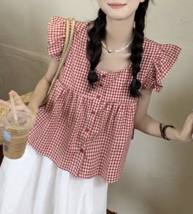 Gingham Ruffle-Sleeve Peplum Blouse Top (Category: Blouses) located in Mandaluyong City. Submitted by cxia_style (Listing ID 1462760282, Image 2). Description: details: ୨ৎ non stretch ୨ৎ w/ buttons ୨ৎ ruffle-sleeve ୨ৎ wide square neckline.