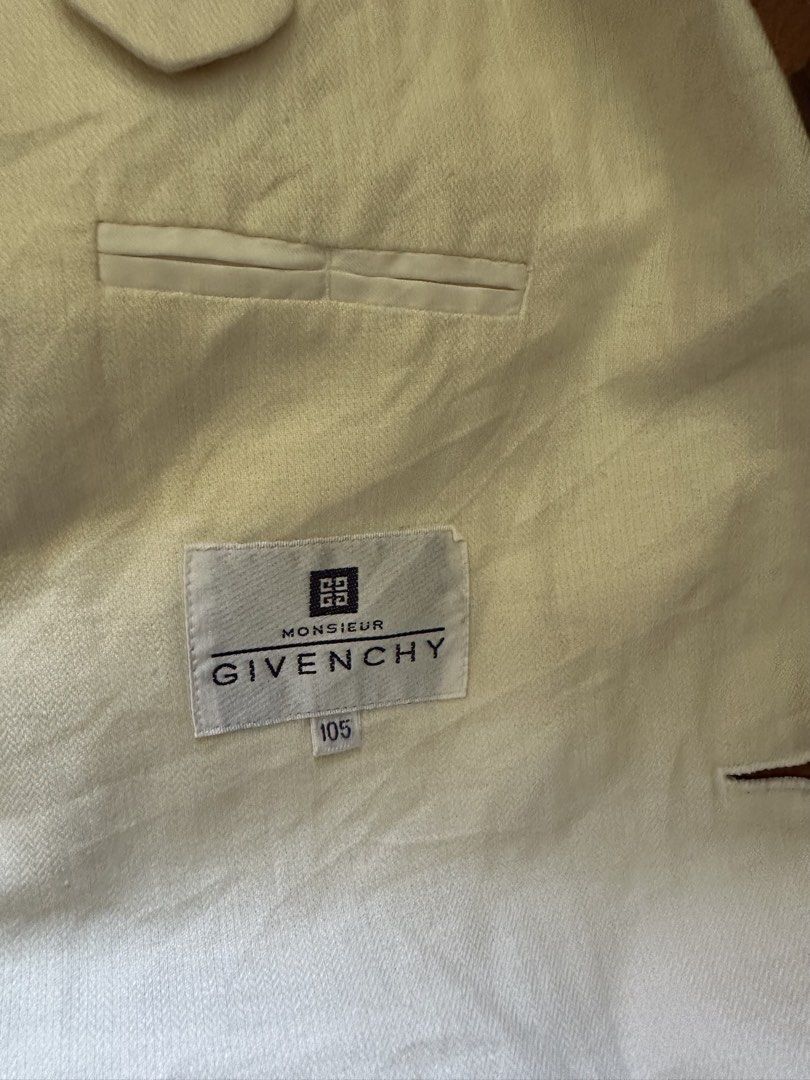 Givenchy Monsieur Blazer (Category: Coats, Jackets and Outerwear) located in Manila. Submitted by chinobustamante17 (Listing ID 1462706942, Image 2). Description: - Classic Givenchy blazer - Light cream color - Two-button closure - Two front pockets - Lined interior - Versatile for smart casual or formal wear - Please check photos for detailed condition.