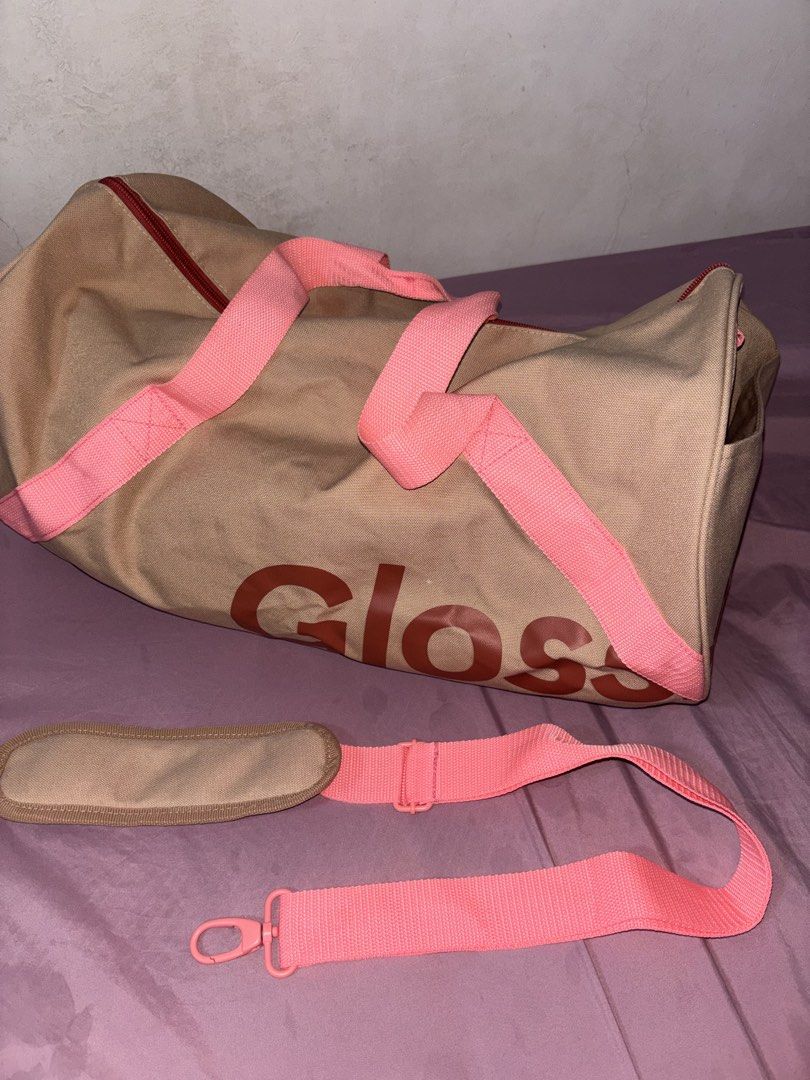 Glossier Duffle Bag (limited edition) (Category: Cross-body Bags) located in Iligan City. Submitted by boldrabbit.778b7e (Listing ID 1462805167, Image 2). Description: - wGlossier Duffle Bag in Desert Rose - Dimensions: 20" x 10" x 10" - Ideal for travel or gym sessions - Features a convenient side pocket - Comes with a detachable shoulder strap and padded strap cover DM FOR MORE DETAILS!!! .