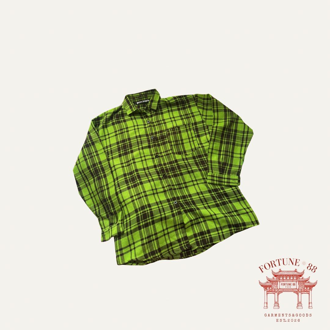 Green Plaid Flannel Shirt (Category: Tshirts & Polo Shirts ) located in Paranaque City. Submitted by f0rtune_88 (Listing ID 1462777458, Image 2). Description: Size: L 22x28 Color: Lime Green / Black Plaid Style: Streetwear / Grunge Fit: Relaxed Fit Details: Button-up front, chest pocket, Palm Angels logo print across the upper back Condition: Preloved, good condition Category: Unisex.