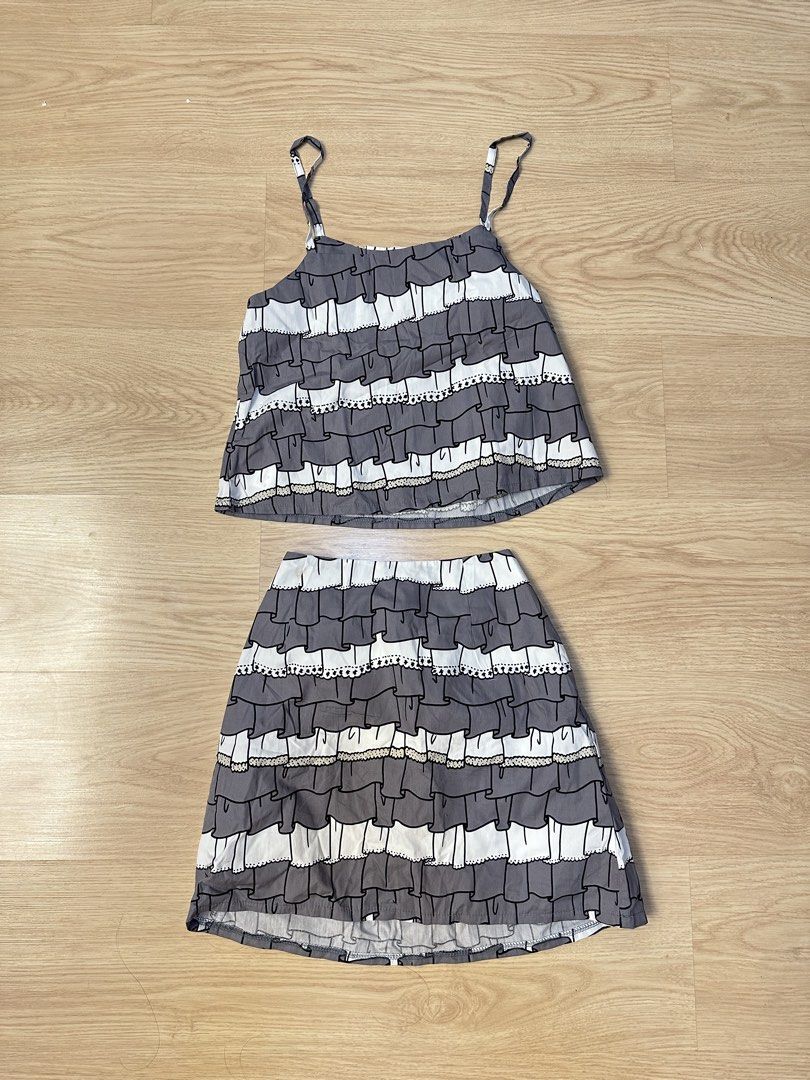 Grey and White Patterned Cami Top and Skirt Set (Category: Sets or Coordinates) located in Santa Rosa. Submitted by luckydear_ (Listing ID 1462712716, Image 1). Description: - Adorable matching set: cami top and skirt - Fun grey, white, and black pattern - Comfortable elastic waistband on skirt - Versatile for casual outings or lounging - Easy to wear and style.