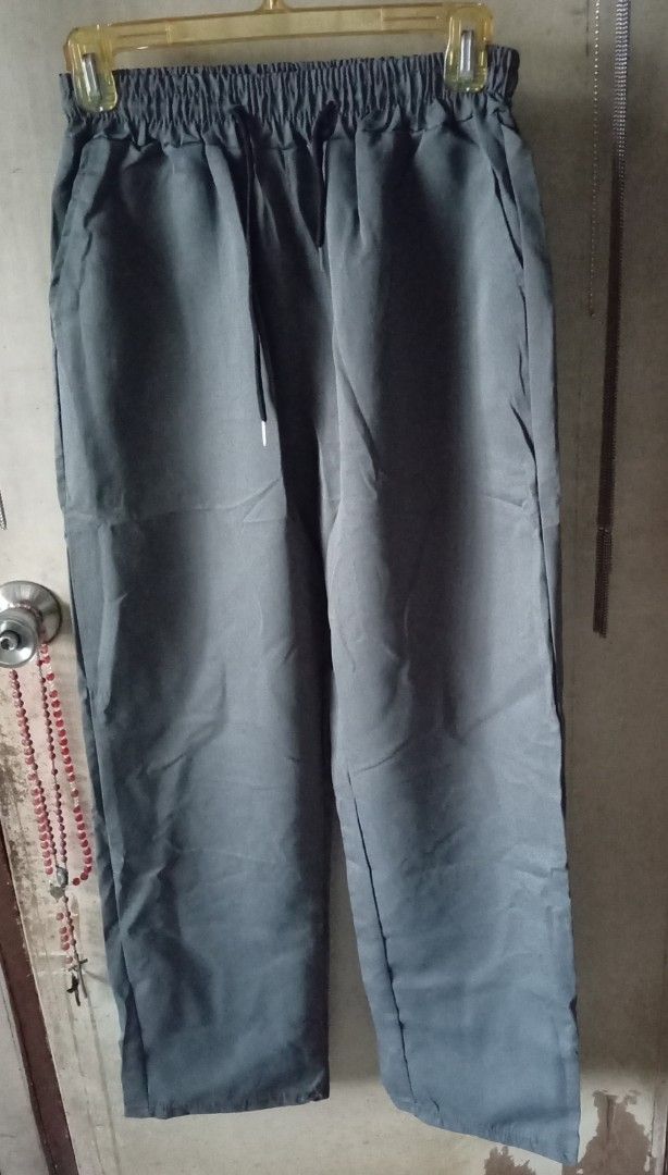 Grey Elastic Waist Pants with Drawstring (Category: Trousers) located in Quezon City. Submitted by chacha30.s (Listing ID 1462759735, Image 1). Description: - Comfy grey pants - Elastic waistband with drawstring for adjustable fit - Two side pockets and two back pockets - Straight leg cut - Ideal for casual wear or lounging - Versatile and easy to styl . Text me at 09277152134 . Stretchable . Buy na po kayo/Offer lang po kayooo.. . Bili na po/Bil