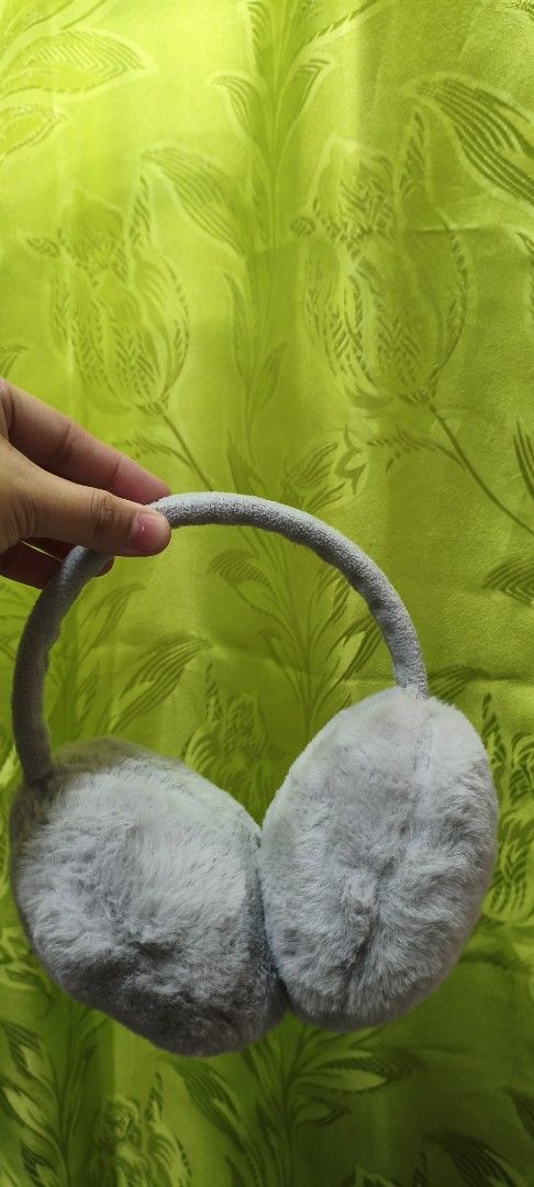 Grey Fuzzy Earmuffs (Category: Other Accessories) located in Quezon City. Submitted by gemaicloset (Listing ID 1462684470, Image 1). Description: - Super soft and fluffy grey earmuffs - Keeps ears warm and cozy - Padded band for extra comfort - Perfect for cold weather - Easy to wear and store.