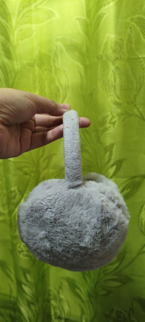 Grey Fuzzy Earmuffs (Category: Other Accessories) located in Quezon City. Submitted by gemaicloset (Listing ID 1462684470, Image 2). Description: - Super soft and fluffy grey earmuffs - Keeps ears warm and cozy - Padded band for extra comfort - Perfect for cold weather - Easy to wear and store.