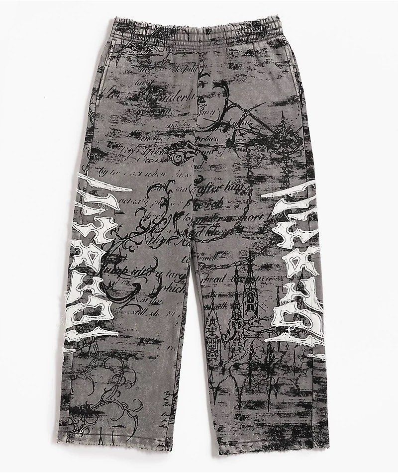 Grey Graphic Print Distressed Sweatpants (Category: Other Bottoms) located in Cabuyao City. Submitted by 0ld_souls (Listing ID 1462866609, Image 1). Description: - Grey sweatpants with all-over graphic print - Distressed details and ripped accents on the sides - Comfortable elastic waistband - Loose, streetwear-inspired fit - Perfect for casual wear.