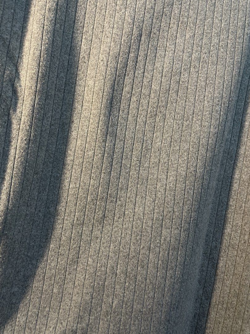 Grey Ribbed Short Sleeve T-Shirt (Category: Shirts) located in Manila. Submitted by sammmm777 (Listing ID 1462815396, Image 3). Description: - Grey t-shirt with a ribbed texture - Short sleeves and crew neck - Stretchy fabric for comfort ( cotton) - same frabric from mafie -( from tiktok shop ).