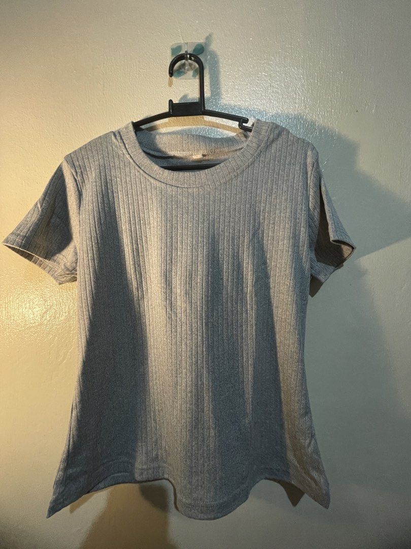 Grey Ribbed Short Sleeve T-Shirt (Category: Shirts) located in Manila. Submitted by sammmm777 (Listing ID 1462815396, Image 1). Description: - Grey t-shirt with a ribbed texture - Short sleeves and crew neck - Stretchy fabric for comfort ( cotton) - same frabric from mafie -( from tiktok shop ).