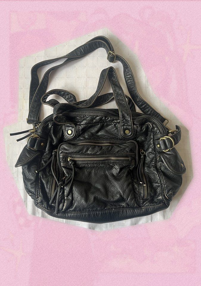 Grunge Biker Y2K Large-Capacity Bag (Category: Shoulder Bags) located in Quezon City. Submitted by stxrrydusty (Listing ID 1462714670, Image 1). Description: ❣️Large-Capacity Shoulder and Sling ⭑ 2 Main Compartments ⭑ Lots of pockets ⭑ Synthetic Leather ⭑ Bronze Hardware ⭑ DM for exact measurements.