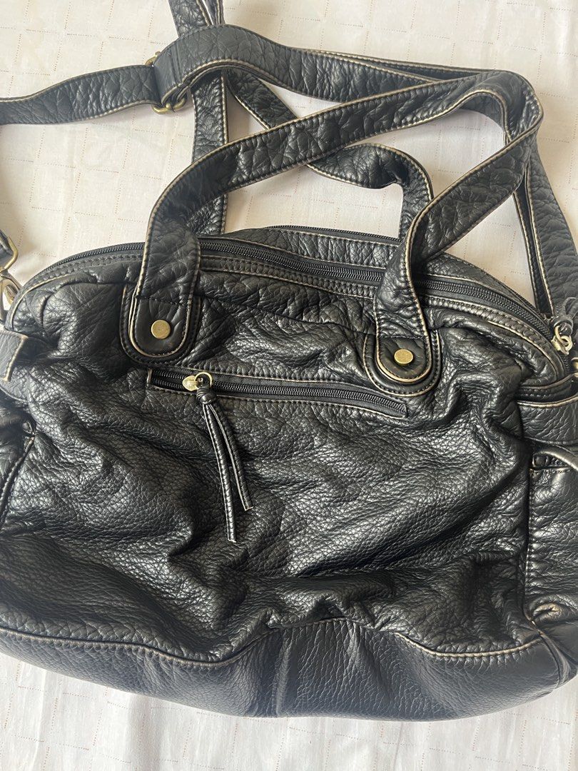 Grunge Biker Y2K Large-Capacity Bag (Category: Shoulder Bags) located in Quezon City. Submitted by stxrrydusty (Listing ID 1462714670, Image 3). Description: ❣️Large-Capacity Shoulder and Sling ⭑ 2 Main Compartments ⭑ Lots of pockets ⭑ Synthetic Leather ⭑ Bronze Hardware ⭑ DM for exact measurements.