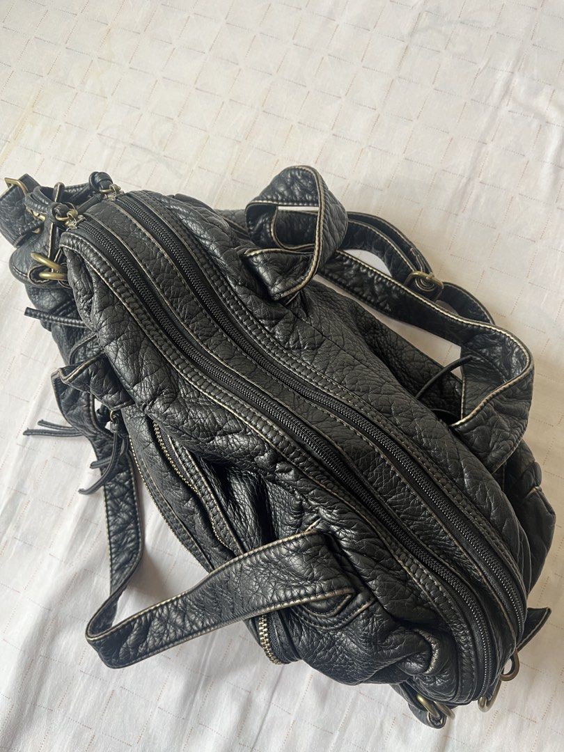 Grunge Biker Y2K Large-Capacity Bag (Category: Shoulder Bags) located in Quezon City. Submitted by stxrrydusty (Listing ID 1462714670, Image 2). Description: ❣️Large-Capacity Shoulder and Sling ⭑ 2 Main Compartments ⭑ Lots of pockets ⭑ Synthetic Leather ⭑ Bronze Hardware ⭑ DM for exact measurements.