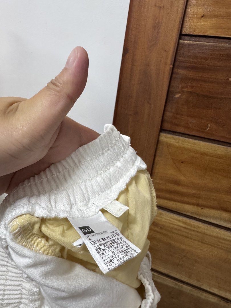 GU Women's Cargo Pants Cream White (Category: Other Bottoms) located in Cavite. Submitted by yakultjeni85475 (Listing ID 1462878956, Image 3). Description: - Cream white cargo pants from GU - Elastic waistband with button closure - Two side pockets - Two cargo pockets on the legs - Comfortable fit for casual wear - Easy to style with various tops and shoes.