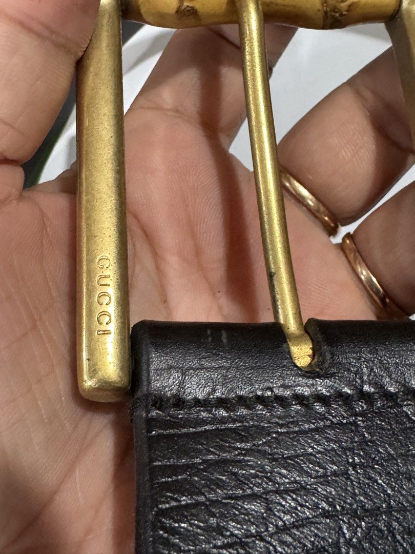 Gucci Belt 100% authentic (Category: Luxury Accessories) located in Manila. Submitted by wildbear.e10374 (Listing ID 1462801272, Image 3). Description: - Authentic Gucci belt - Black leather - Iconic bamboo buckle - Gold-tone hardware with Gucci logo engraving - Classic, versatile accessory - Shows some signs of wear on leather and hardware, consistent with use this belt is 100% authentic. Made in Italy .
