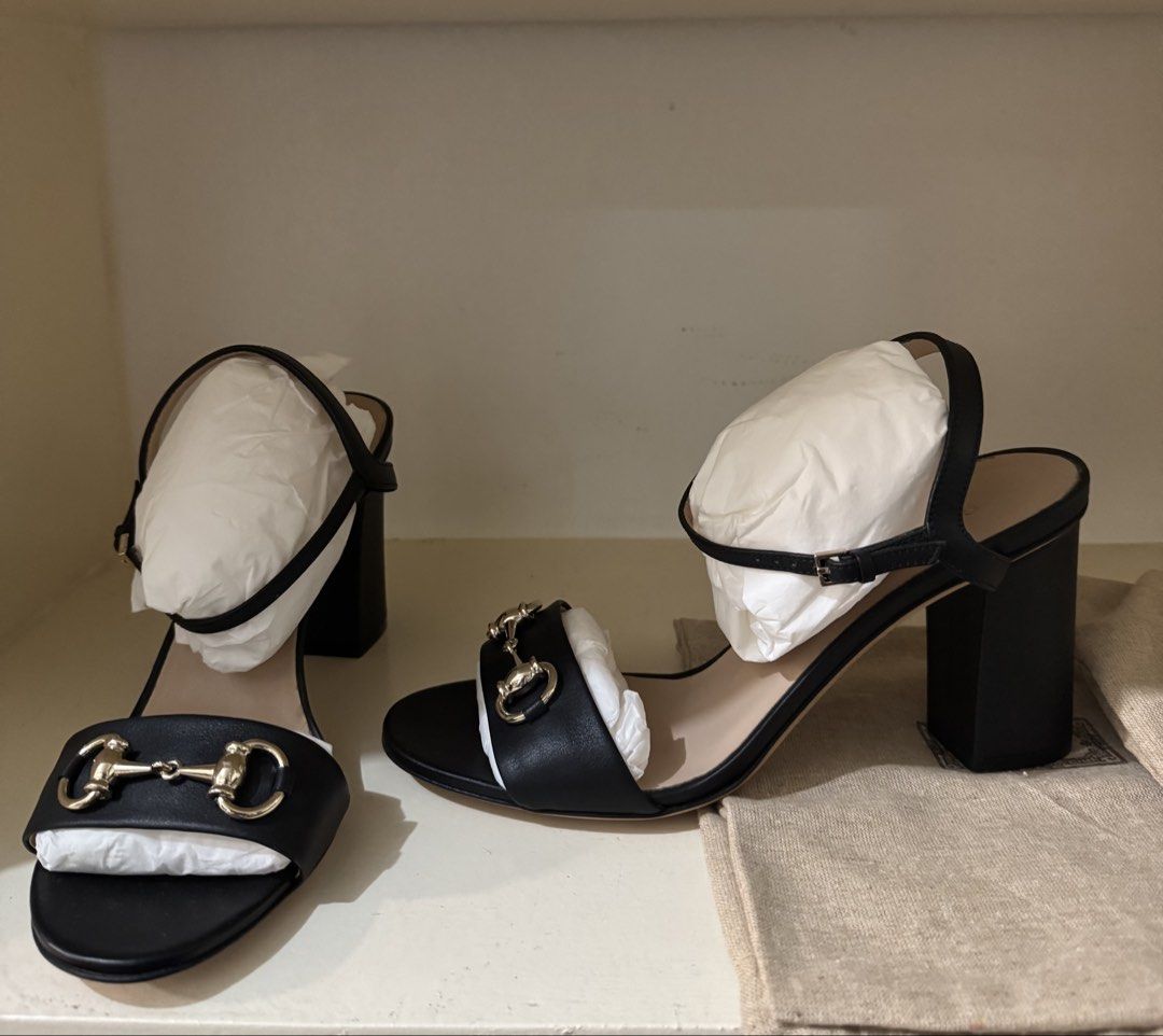 Gucci Black Leather Horsebit Sandals (Category: Flats & Sandals) located in Manila. Submitted by nenitab.cambiador (Listing ID 1462860547, Image 2). Description: - Authentic Gucci black leather sandals - Iconic horsebit detail on front strap - Adjustable ankle strap for a secure fit - Comfortable block heel - Comes with original dust bags - Perfect for dressing up or down.