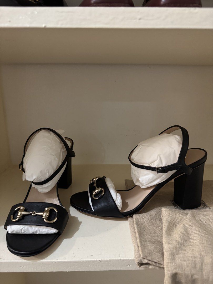 Gucci Black Leather Horsebit Sandals (Category: Flats & Sandals) located in Manila. Submitted by nenitab.cambiador (Listing ID 1462860547, Image 3). Description: - Authentic Gucci black leather sandals - Iconic horsebit detail on front strap - Adjustable ankle strap for a secure fit - Comfortable block heel - Comes with original dust bags - Perfect for dressing up or down.