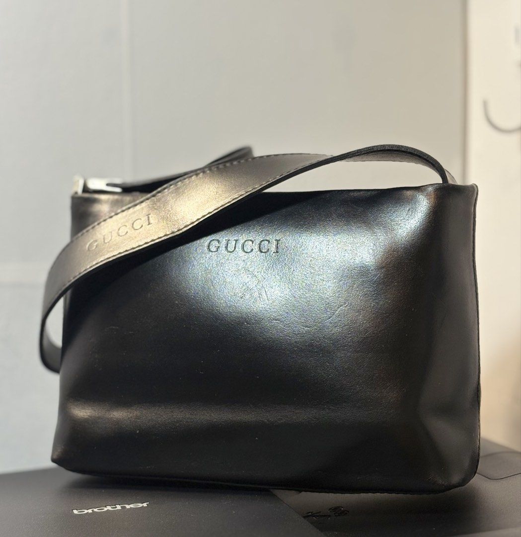 Gucci Black Leather Shoulder Bag (Category: Luxury Bags & Wallets) located in Manila. Submitted by hippiesph (Listing ID 1462885210, Image 1). Description: Vintage 1990s Gucci bag black genuine leather - shoulder bag Authentic / vintage Still in great condition Have normal sign of usage since vintage Price: 6,000 + sf .