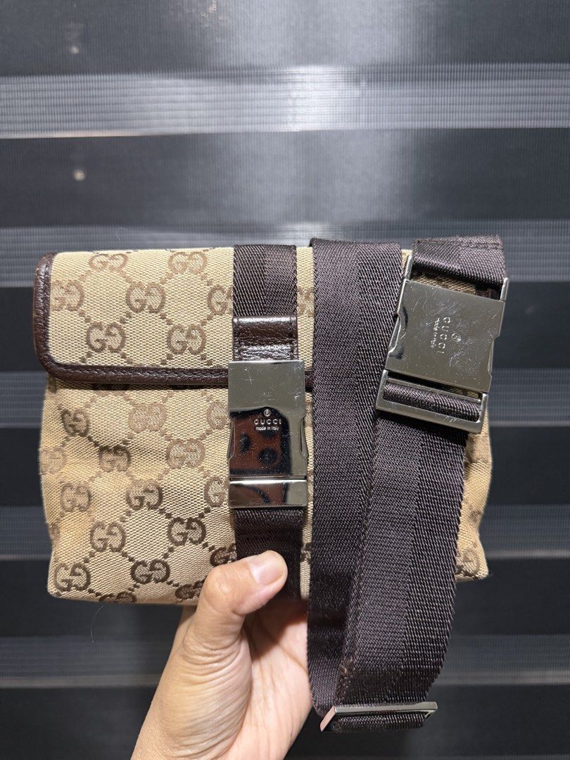 Gucci Monogram Canvas Waist Bag Belt Bag (Category: Luxury Bags & Wallets) located in Tarlac. Submitted by rizasdeclutteringonline (Listing ID 1462855821, Image 1). Description: - Authentic Gucci GG monogram canvas waist bag - Signature brown GG pattern - Adjustable dark brown strap with engraved Gucci logo buckle - Perfect for keeping essentials accessible - Made in Italy - good condition - no rubs sa mga side - no cracks also - kasya hanggang s