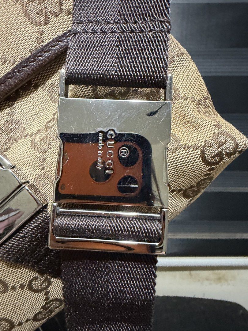 Gucci Monogram Canvas Waist Bag Belt Bag (Category: Luxury Bags & Wallets) located in Tarlac. Submitted by rizasdeclutteringonline (Listing ID 1462855821, Image 2). Description: - Authentic Gucci GG monogram canvas waist bag - Signature brown GG pattern - Adjustable dark brown strap with engraved Gucci logo buckle - Perfect for keeping essentials accessible - Made in Italy - good condition - no rubs sa mga side - no cracks also - kasya hanggang s