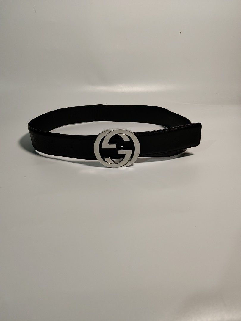 GUCCI MONOGRAM GG BUCKLE (Category: Belts) located in Valencia. Submitted by coolwolf_27a64f (Listing ID 1462834736, Image 1). Description: Selling an authentic Gucci leather belt featuring the iconic silver-tone Interlocking G buckle. A timeless and versatile luxury accessory perfect for both casual and formal wear. 34Inch.