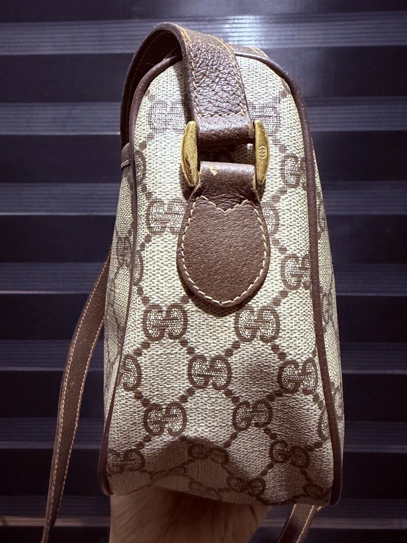 Gucci Monogram Shoulder Bag (Category: Luxury Bags & Wallets) located in Tarlac. Submitted by rizasdeclutteringonline (Listing ID 1462860521, Image 3). Description: - Classic Gucci shoulder bag - Beige and brown monogram canvas - Genuine leather trim and strap - Gold hardware details - Adjustable strap with buckle closure - Secure zip top closure - Timeless and versatile for everyday use -powdery na sa loob pero yun bulsa sa loob ok. Kayo na magl
