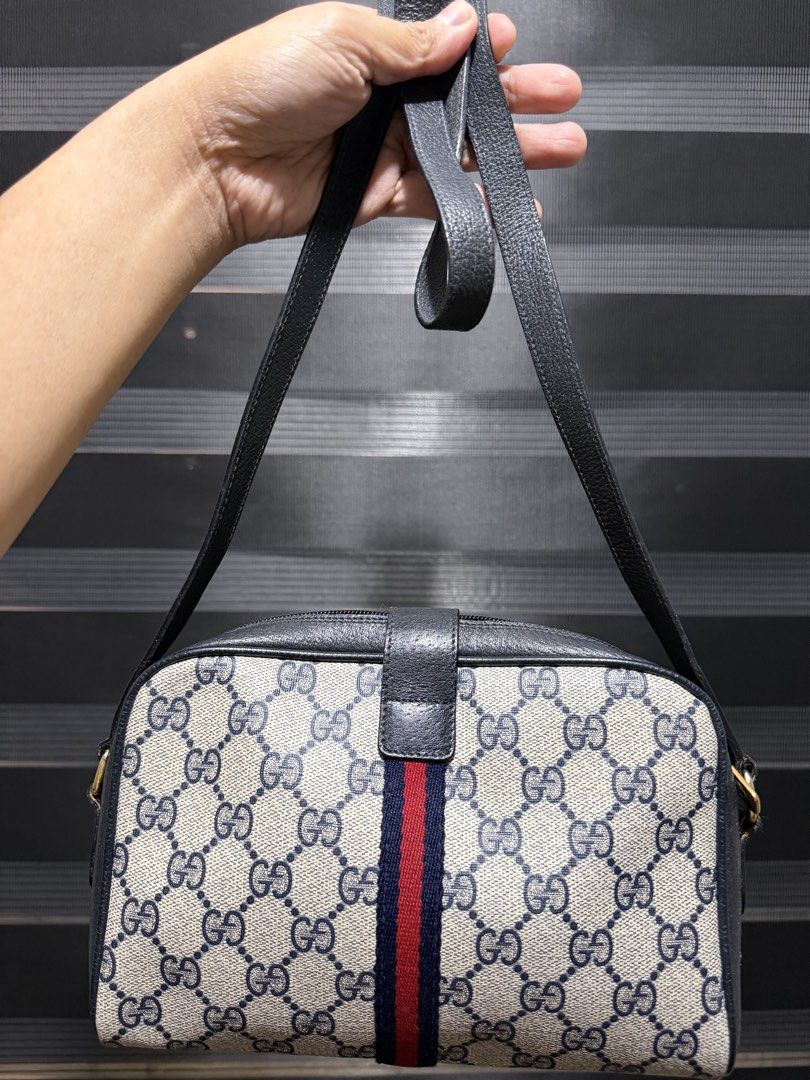 Gucci Monogram Shoulder Bag with Red and Blue Stripe (Category: Luxury Bags & Wallets) located in Tarlac. Submitted by rizasdeclutteringonline (Listing ID 1462860215, Image 2). Description: - Classic Gucci monogram shoulder bag - Iconic GG pattern - Leather trim and strap - Signature red and blue stripe detail on front flap - Gold hardware - Zipper closure - Timeless piece for your collection - powdery na sa loob ganito na nun nabili ko kayo nala