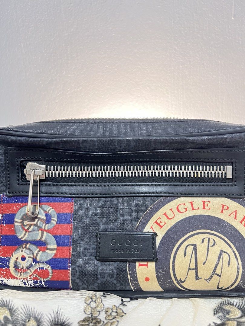 Gucci Monogram Snake & Planet Print Belt Bag (Category: Luxury Bags & Wallets) located in Las Pinas. Submitted by jpe27 (Listing ID 1462862498, Image 2). Description: - Authentic Gucci Supreme Belt Bag - Iconic GG Monogram Canvas, limited edition - Unique Snake and Planet Patch Detail - Secure Zip Closure - Adjustable Strap for Custom Fit - Made in Italy - Ideal for Travel and Everyday Carry .