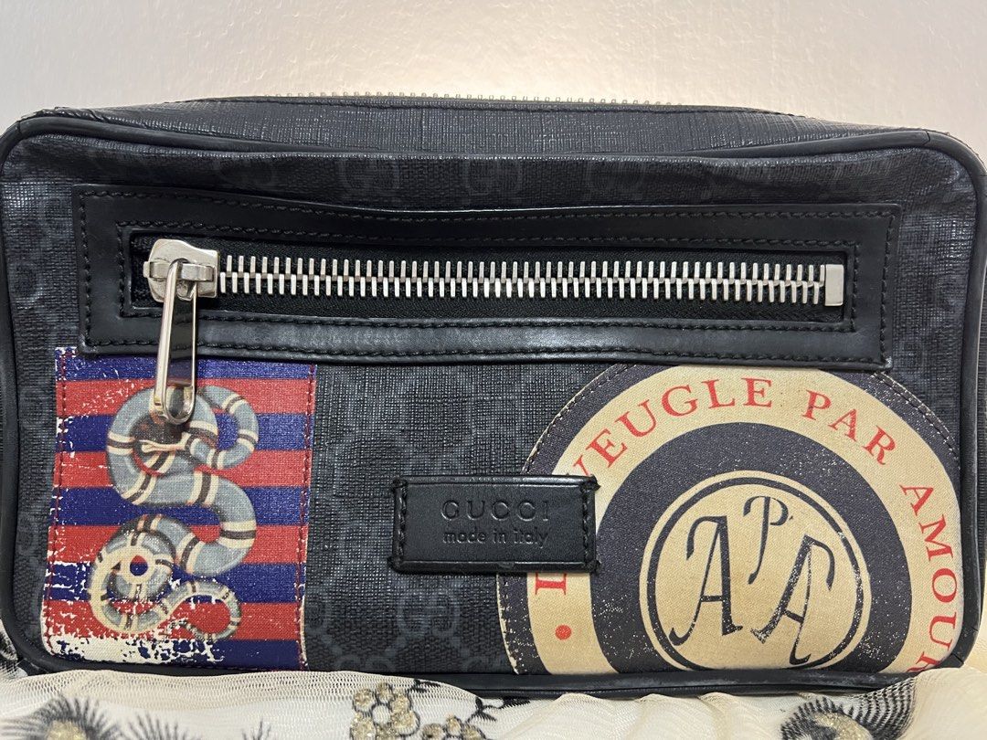 Gucci Monogram Snake & Planet Print Belt Bag (Category: Luxury Bags & Wallets) located in Las Pinas. Submitted by jpe27 (Listing ID 1462862498, Image 1). Description: - Authentic Gucci Supreme Belt Bag - Iconic GG Monogram Canvas, limited edition - Unique Snake and Planet Patch Detail - Secure Zip Closure - Adjustable Strap for Custom Fit - Made in Italy - Ideal for Travel and Everyday Carry .