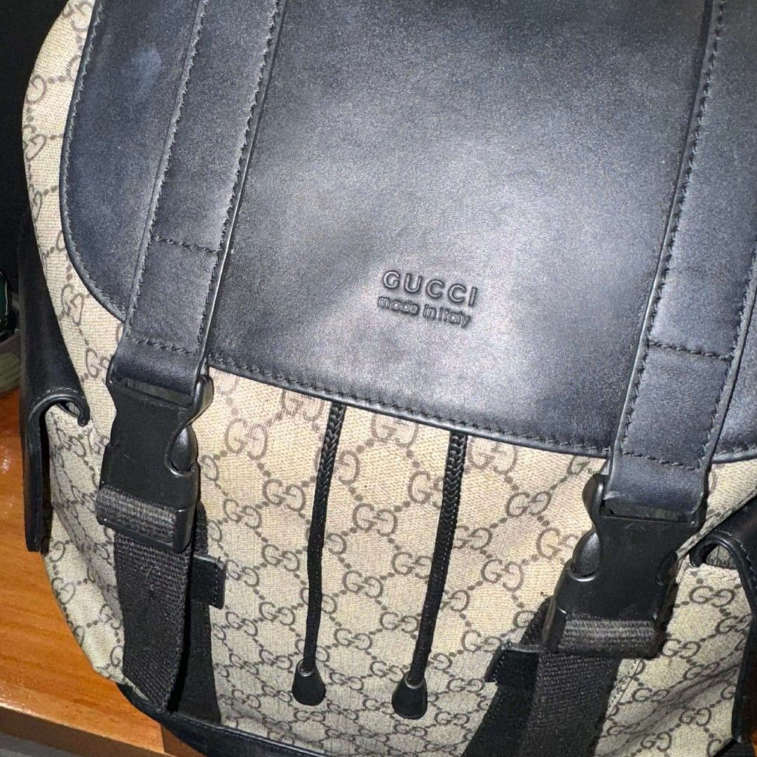 Gucci Soft Backpack Monogram GG Black/Brown (Category: Luxury Bags & Wallets) located in Rizal. Submitted by youngwolf-5f02 (Listing ID 1462806263, Image 2). Description: - Authentic Gucci Soft Backpack - Classic black and brown GG monogram pattern - Genuine leather trim and straps - Interior zip pocket for essentials - Expertly crafted in Italy - Ideal for everyday adventures or travel.