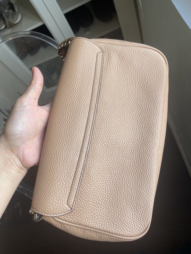 Gucci Soho Chain Bag Beige (Category: Luxury Bags & Wallets) located in Mauban. Submitted by maimaillamas (Listing ID 1462793966, Image 2). Description: - Authentic Gucci Soho Disco Bag - Color: Beige - Material: Pebbled Leather - Hardware: Light gold tone chain strap - Signature Detail: Iconic interlocking G logo embossed on front - Interior: 1 zip pocket, 1 slip pocket - Includes: Dust bag and authenticity cards -Can be worn as a shoulder bag, 