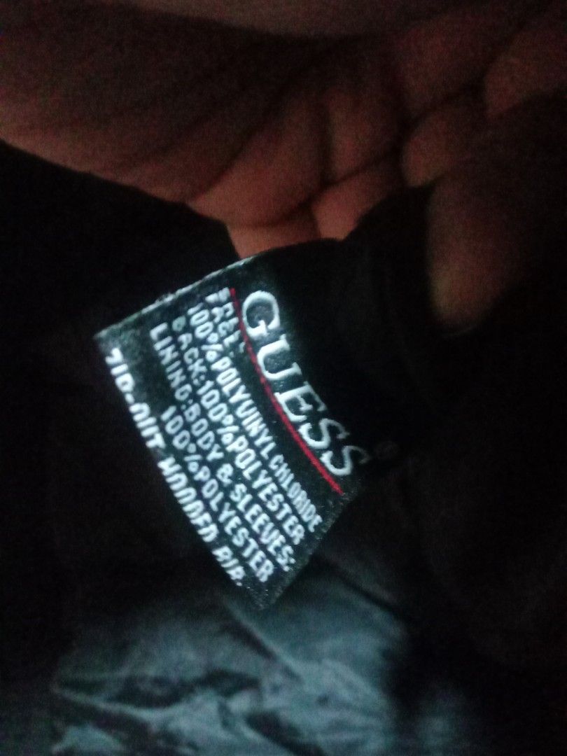 Guess Black Leather Jacket XL (Category: Coats, Jackets and Outerwear) located in Manila. Submitted by 4amnlthriftstore (Listing ID 1462810390, Image 2). Description: - Guess Jacket - Color: Black - Size: XL - Material: Polyvinyl Chloride (PVC) face with Polyester lining - Ideal for everyday wear.