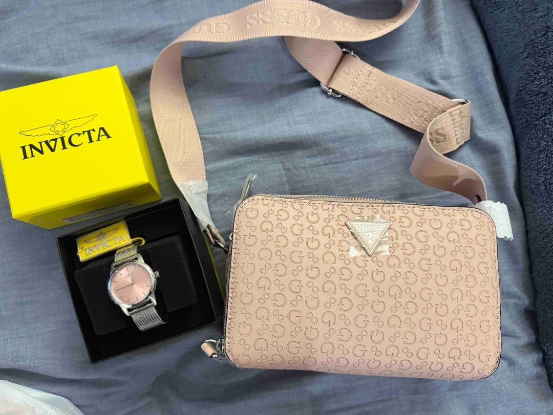Guess Monogram Crossbody Bag Pink (Category: Cross-body Bags) located in Pasig City. Submitted by janalopez904 (Listing ID 1462864754, Image 1). Description: - Authentic Pink Guess crossbody bag - Features iconic all-over G logo pattern - Stylish silver Guess logo hardware - Secure zipper closure - Adjustable strap for comfortable wear - Comes with original tags - Ideal for everyday use and carrying your essentials.
