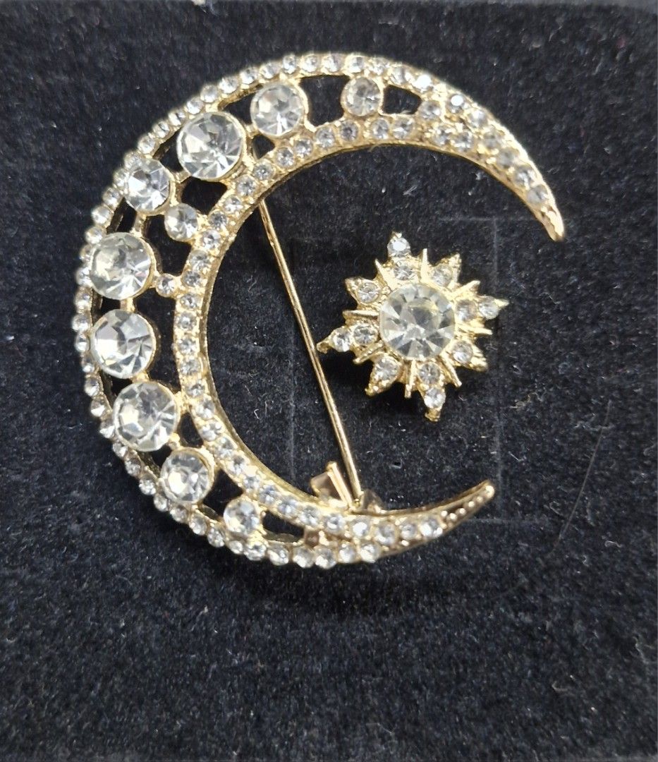 Half Moon Star Brooch (Category: Brooches) located in Taguig. Submitted by mommaschoice (Listing ID 1462800204, Image 1). Description: Brand New Unisex use Elegantly crafted design Adorned w/ rhinestones 2 brooches in one Ships nationwide.