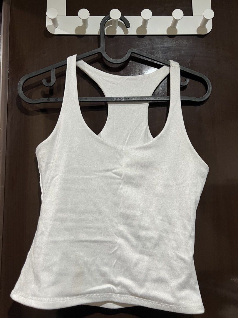 Halter Top (Category: Sleeveless) located in Manila. Submitted by shinneee (Listing ID 1462846339, Image 1). Description: WHITE HALTER TOP free size - stain in the front - can be FREE with any other purchase .