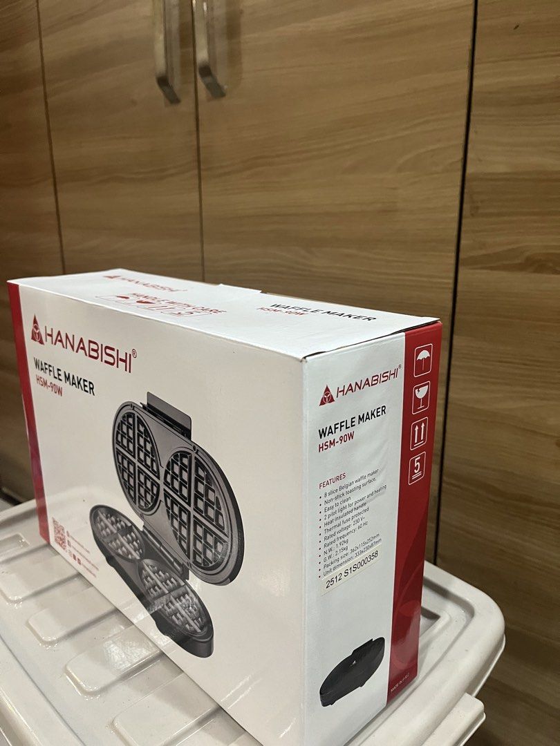 Hanabishi Waffle Maker HSM-90W (Category: Other Kitchen Appliances) located in Manila. Submitted by jericho_chan (Listing ID 1462723302, Image 3). Description: - Hanabishi Belgian Waffle Maker (Model: HSM-90W) - Perfect for making delicious Belgian waffles - Features a non-stick surface for easy food release - Simple to clean after use - Indicator lights for power and heating status - Rated Voltage: 230V - Rated Frequency: 60Hz - Net Weight: 1.2k