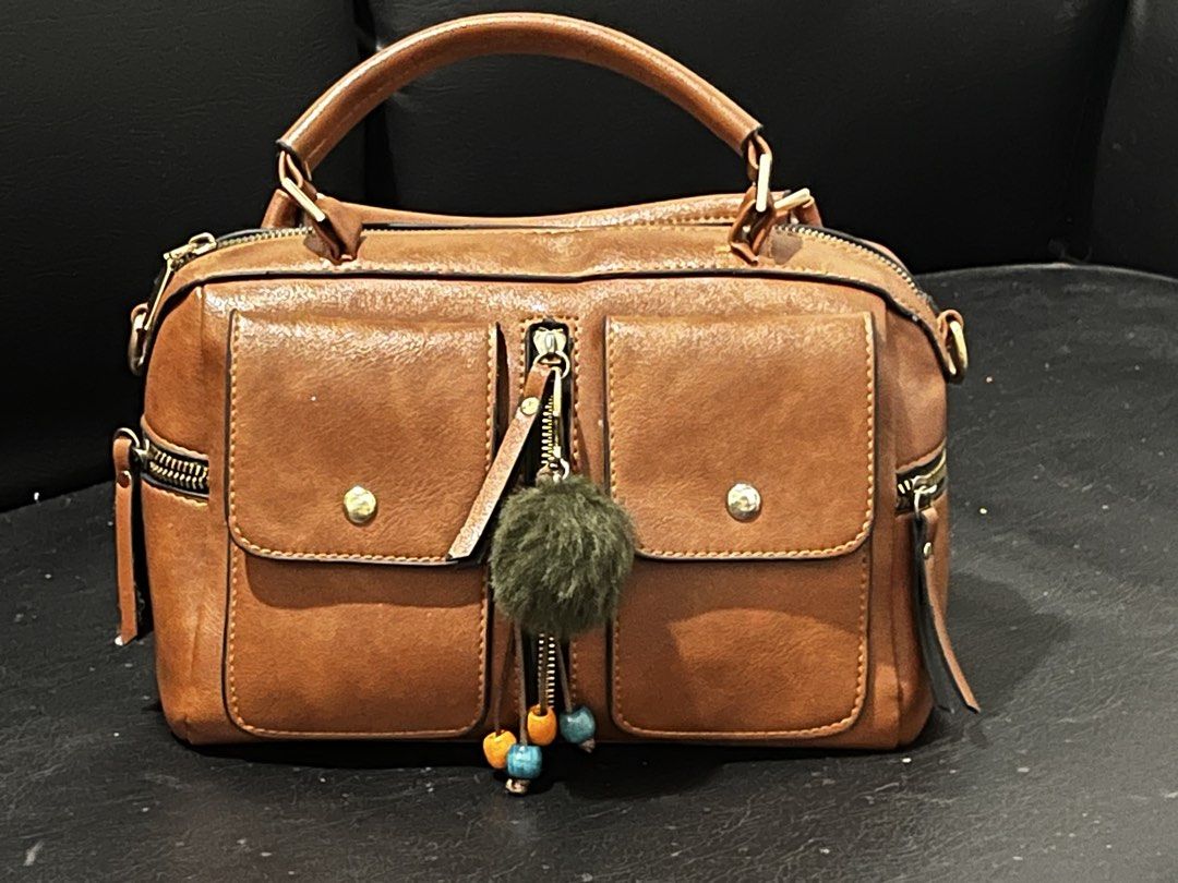 Hand bag (Category: Cross-body Bags) located in Bansalan. Submitted by jhalmar (Listing ID 1462769684, Image 1). Description: Brand new handbag for women .