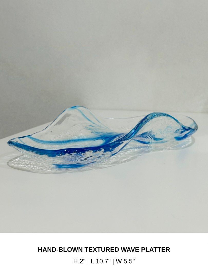 Hand-Blown Textured Wave Platter (Category: Dinnerware & Cutlery) located in Manila. Submitted by anaya_d (Listing ID 1462788527, Image 2). Description: Beautiful hand-blown glass platter. Features a textured wave design 🌀 Great for displaying fruit, holding keys, or as a decorative piece. Adds a pop of color to any table setting. Unique, one-of-a-kind piece..