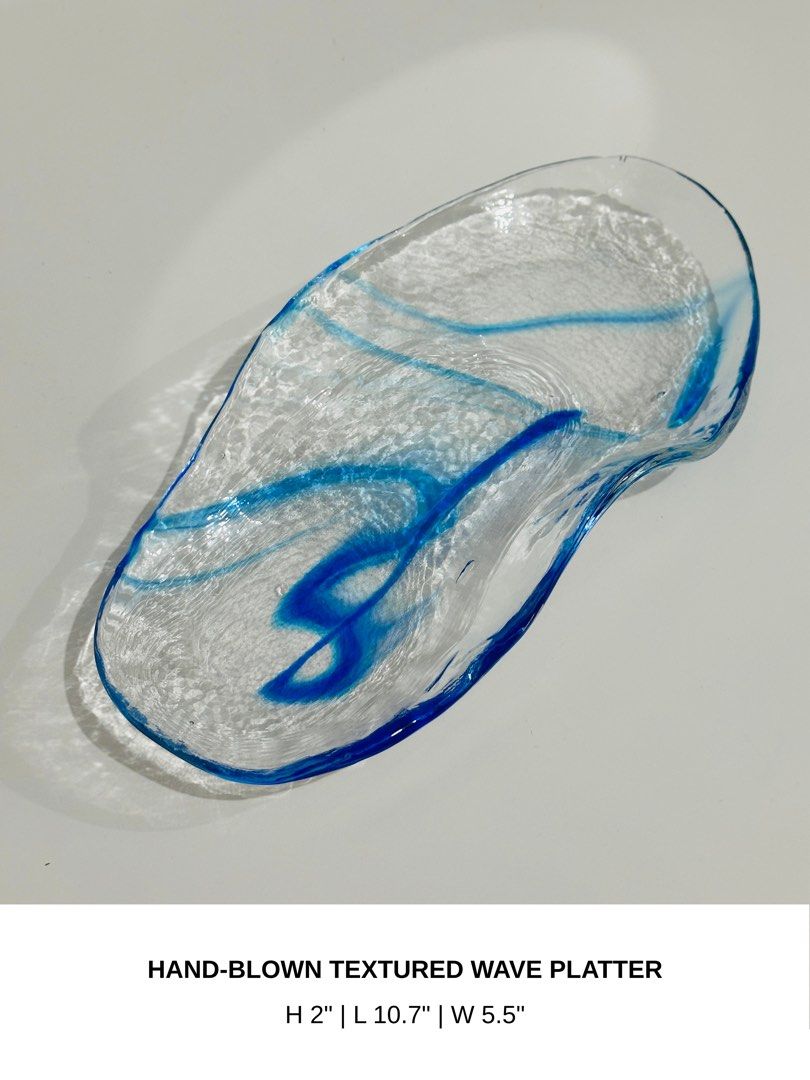 Hand-Blown Textured Wave Platter (Category: Dinnerware & Cutlery) located in Manila. Submitted by anaya_d (Listing ID 1462788527, Image 3). Description: Beautiful hand-blown glass platter. Features a textured wave design 🌀 Great for displaying fruit, holding keys, or as a decorative piece. Adds a pop of color to any table setting. Unique, one-of-a-kind piece..