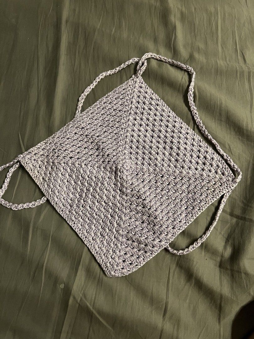 Handmade Grey Crochet Halter Top (Category: Sleeveless) located in Paranaque City. Submitted by dubaichocolei (Listing ID 1462741661, Image 1). Description: - Handmade grey crochet halter top - Square shape with tie straps - Unique textured pattern - Ideal for festivals or beachwear - Versatile: pairs well with jeans or shorts.