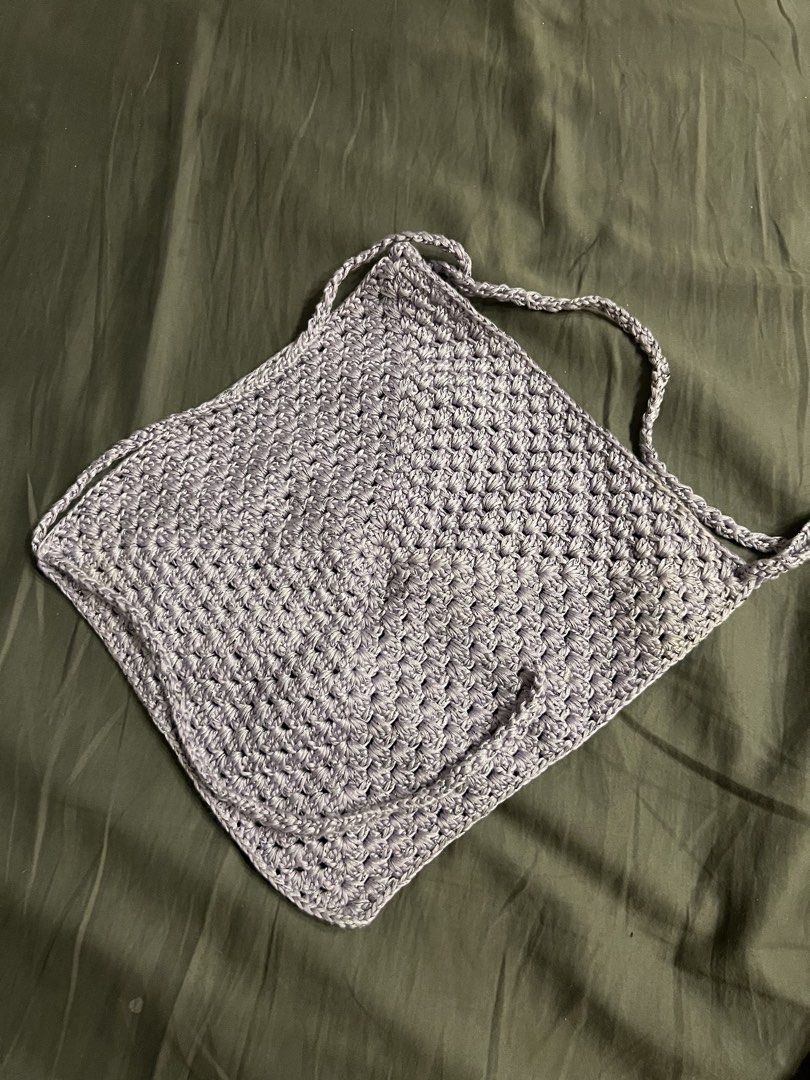 Handmade Grey Crochet Halter Top (Category: Sleeveless) located in Paranaque City. Submitted by dubaichocolei (Listing ID 1462741661, Image 2). Description: - Handmade grey crochet halter top - Square shape with tie straps - Unique textured pattern - Ideal for festivals or beachwear - Versatile: pairs well with jeans or shorts.