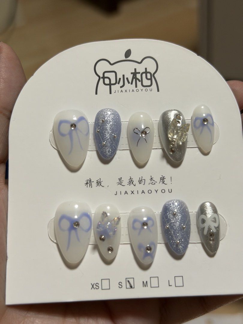Handmade reusable nails (White/Blue/Silver) (Category: Hands & Nails) located in Bacoor. Submitted by editbyl (Listing ID 1462823370, Image 1). Description: Handmade reusable nails in short-length, almond shape and small size..