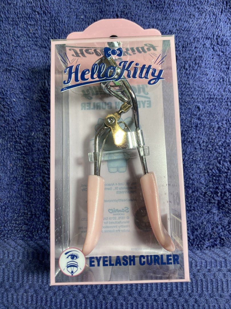 Hello Kitty Eyelash Curler Pink Handle (Category: Makeup) located in Muntinlupa City. Submitted by mj.finds (Listing ID 1462840590, Image 1). Description: - Cute Kitty eyelash curler - Pink handles with Kitty logo - Comes in original packaging - Perfect for curling your lashes - A fun addition to your makeup collection.