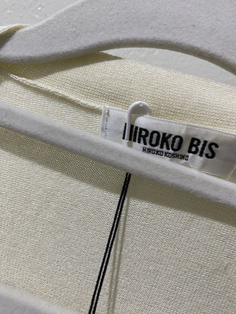Hiroko bis cardigan (Category: Longsleeves) located in Makati City. Submitted by indaysukaycloset (Listing ID 1462758906, Image 3). Description: 🤍 BNWT! HIROKO BIS by HIROKO KOSHINO Cardigan - Designer Size: Free / M-L ✅ Details: - BRAND NEW with tag! HIROKO BIS Japan designer - Color: Ivory / Cream - V-neck, long sleeve, button front - With beaded embroidery pockets - white bugle beads, super elegant! - Soft knit, lightweight, high quality - Lu