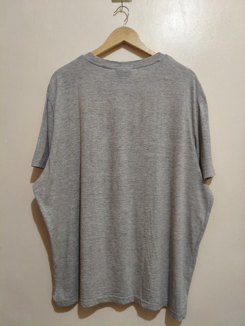 H&M Gray Cotton Shirt (Category: Tshirts & Polo Shirts ) located in Mandaluyong City. Submitted by frivsthriftsph (Listing ID 1462769417, Image 2). Description: H&M Gray Cotton Shirt Size XXL on tag. Actual dimes are 26W by 30L. Lightly used condition. Color rate is 10/10. No issue..