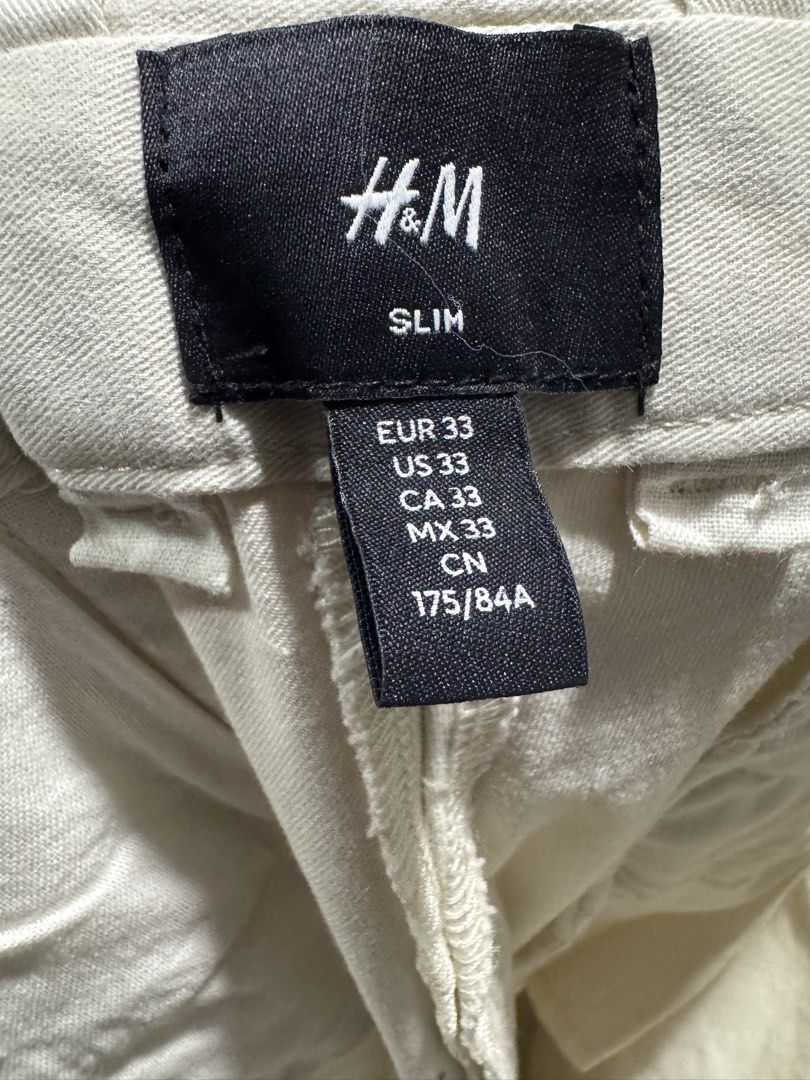 H&M Slim Fit White Pants (Category: Chinos) located in Taguig. Submitted by rdeclutter1 (Listing ID 1462749690, Image 3). Description: H&M Slim Fit White Pants Color: White / Off-White Size: US 33 Dimensions: Length: 40.5in, Waist: 35in Shipping from BGC.