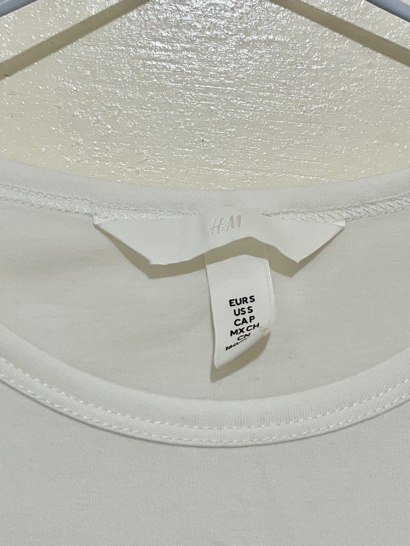 h&m white baby tee (Category: Shirts) located in Bulacan. Submitted by wear.elocin (Listing ID 1462760832, Image 2). Description: .